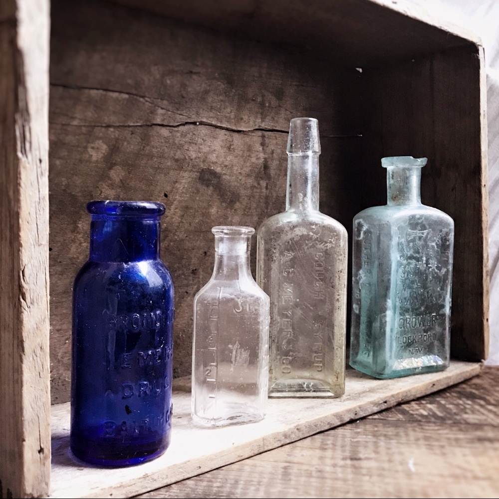 Set of Four Antique Glass Medicine Bottles
